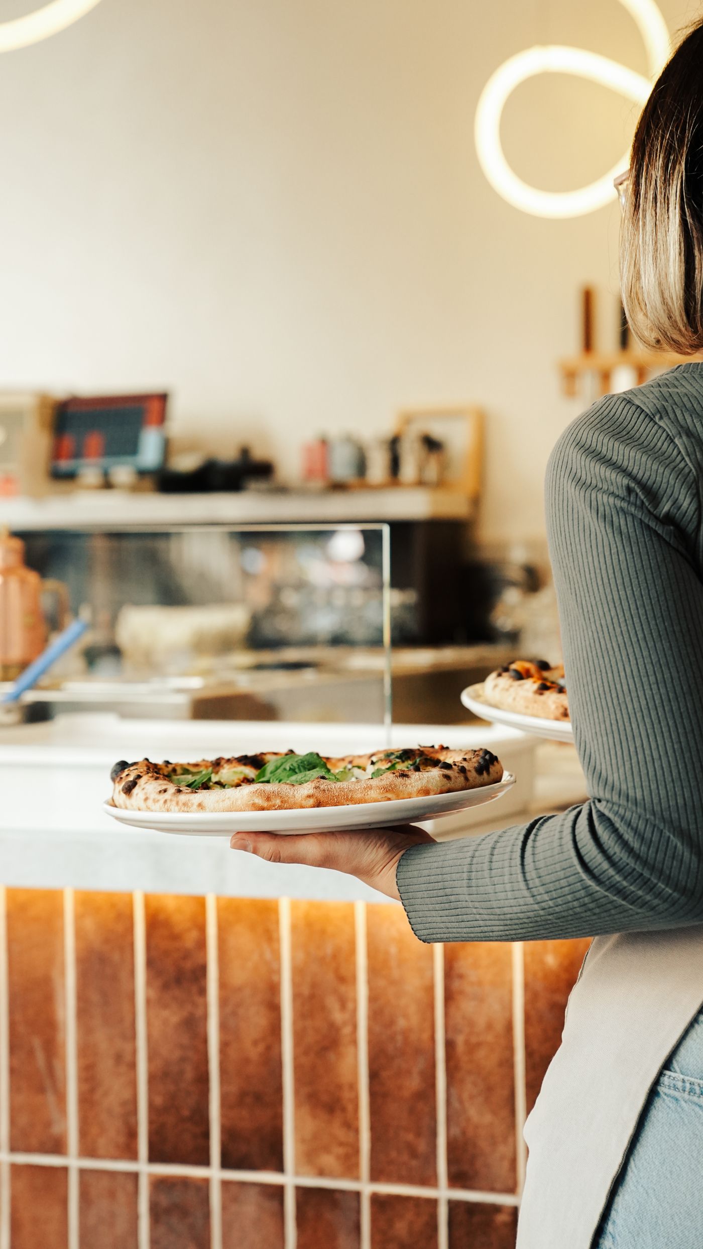 Pizza being served